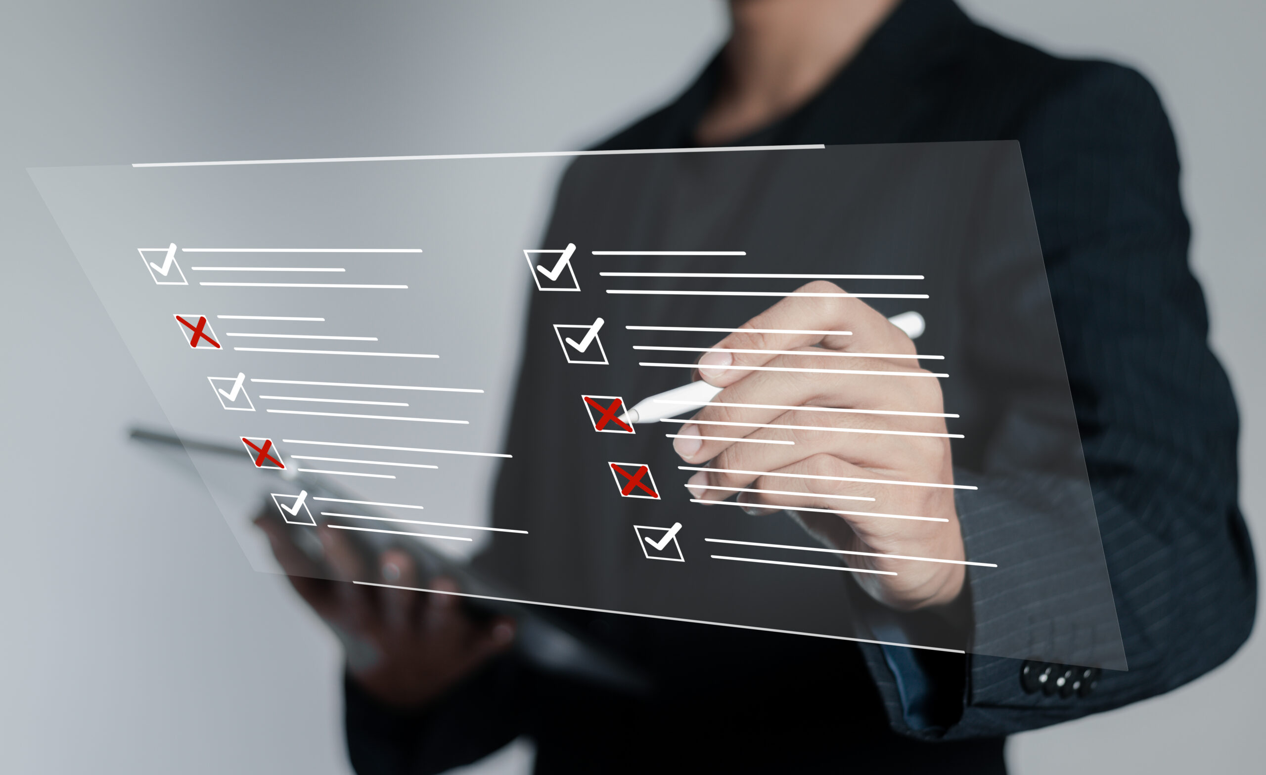 Online survey form concept, businessman ticks checklist and takes online assessment survey test. filling survey form, answer questions of test.